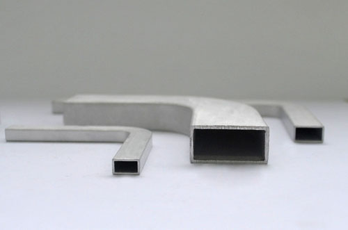 Rectangular rigid E/H bend waveguide tube